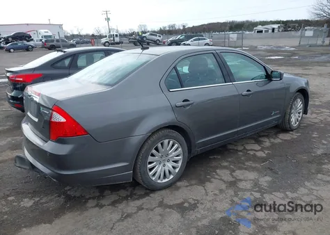 2012 Ford Fusion Hybrid z USA, uszkodzony, nr VIN 3FADP0L33CR315128